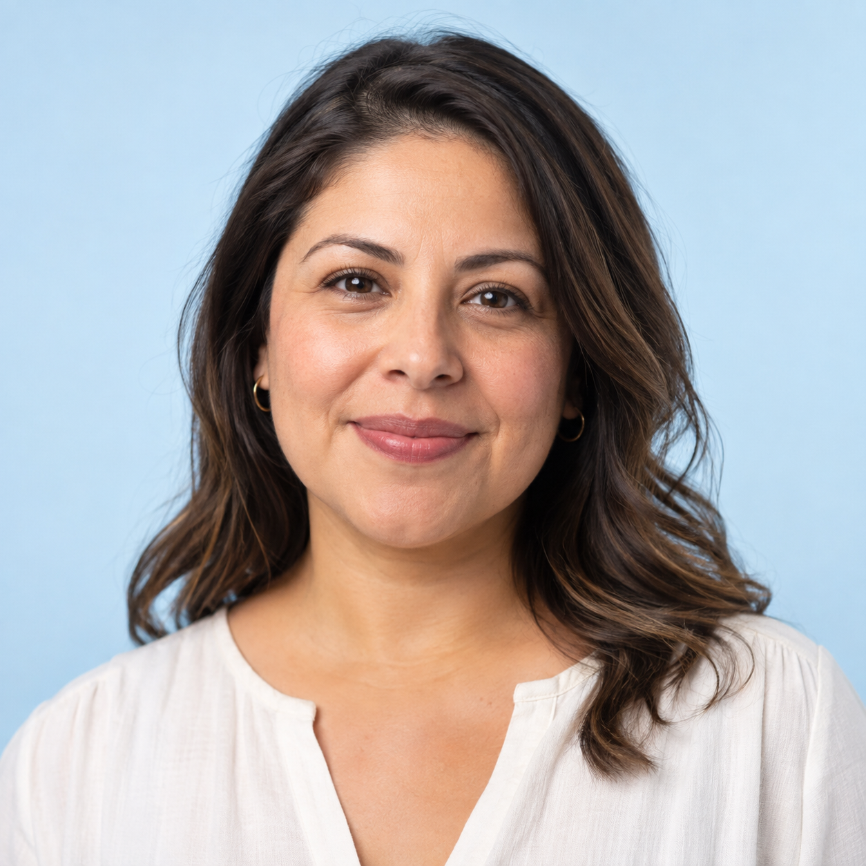 Portrait of Nusrat, a Bruna Financial Services customer